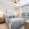 Carpeted furnished bedroom at The Lively Murrells Inlet