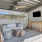 The Lively Murrells Inlet outdoor lounge section with an outdoor TV