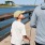 Lifestyle photo of father and son walking a pier to fish