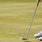 Lifestyle photo of man golfing on a sunny day