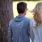 Lifestyle photo of a couple walking in a park